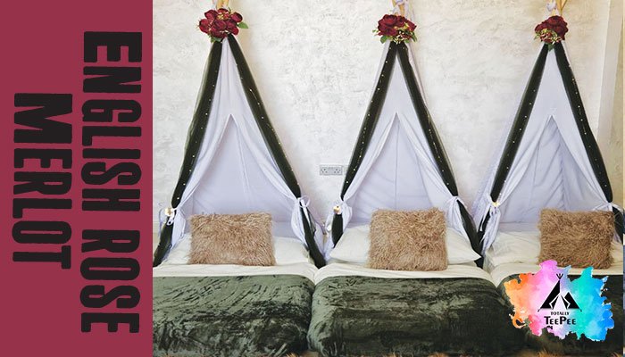 rose garden themed teepee sleepover setup in Dubai luxury girls teepee party with merlot flowers and fairy lights totally teepee rose garden sleepover in Sharjah UAE floral teepee tents for girls birthday sleepover in Ras Al Khaimah cozy indoor sleepover setup with faux flowers and LED lights UAE